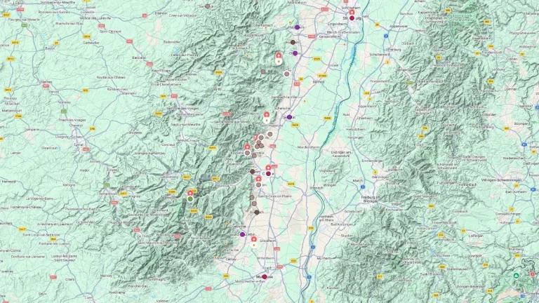 Alsace tourist map stretching north to south through vineyards and small villages with multiple marked stops along the scenic valley between mountains and plains.