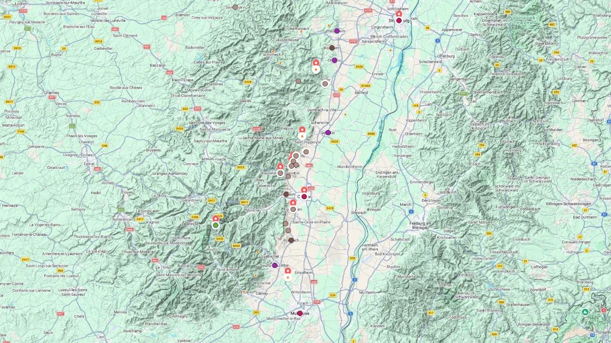 Alsace tourist map stretching north to south through vineyards and small villages with multiple marked stops along the scenic valley between mountains and plains.