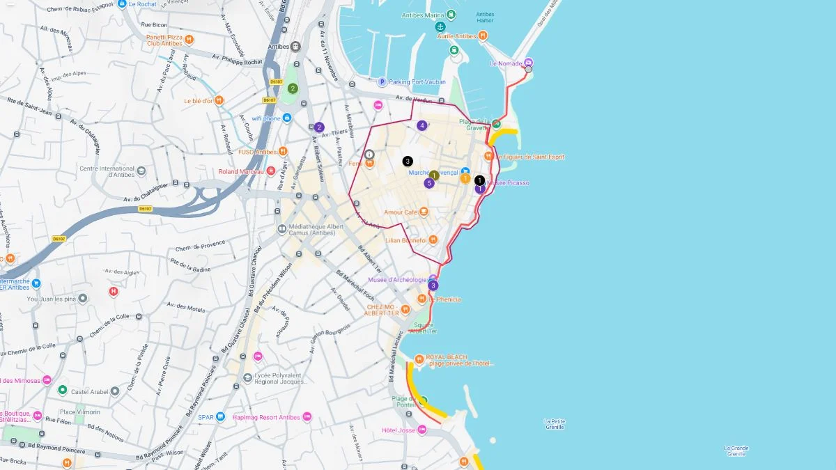 Antibes tourist map highlighting a coastal walking route around the old town and port with stops near beaches, markets, and the Picasso Museum.