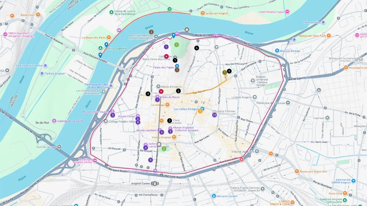 Avignon tourist map outlining a circular route inside the city walls with stops near Palais des Papes, bridges, and central squares along the Rhône River.