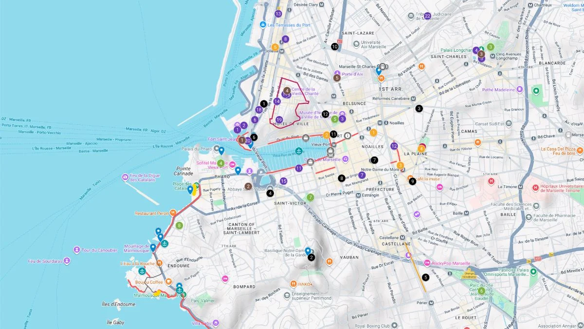 Marseille tourist map marking a route from the Old Port out toward the coastline and nearby neighborhoods with stops near landmarks, viewpoints, and seaside paths.