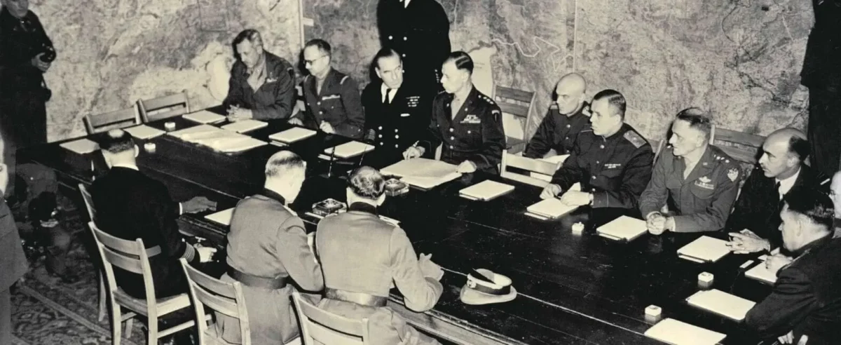 Historic photograph inside the Museum of the Surrender in Reims, where military leaders once gathered, a poignant historical site.