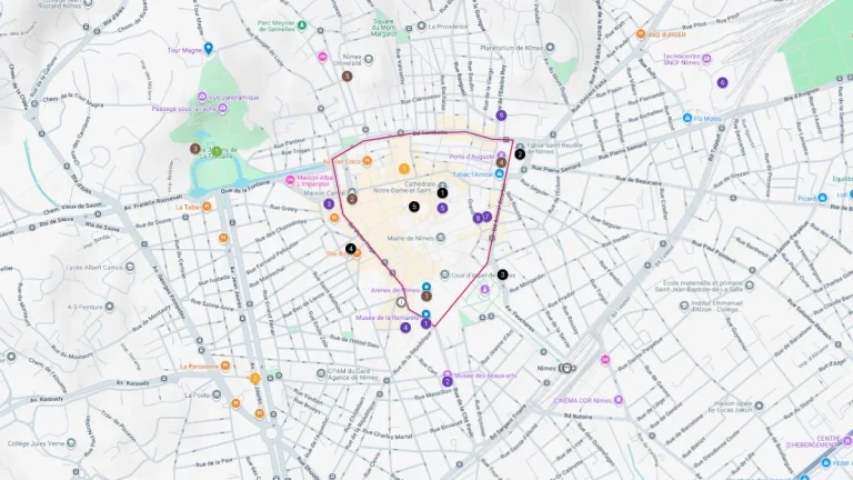 Nimes tourist map outlining a walking route through the historic center with stops near Roman landmarks like the arena and Maison Carrée.