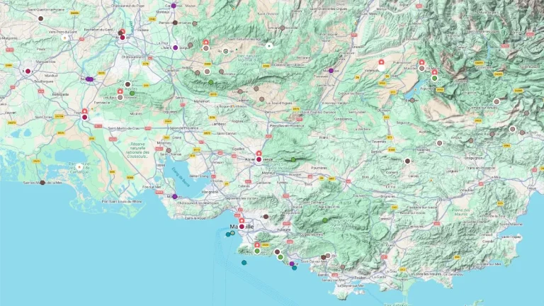 Provence tourist map showing a broad regional layout with multiple destinations marked across cities, countryside, and coastal areas including Marseille and surrounding villages.