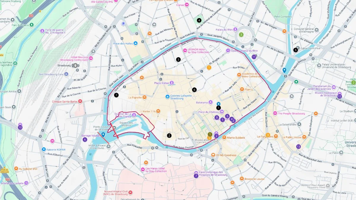 Strasbourg tourist map highlighting a walking route through the old town and along canals with stops near Petite France, the cathedral, and central squares.
