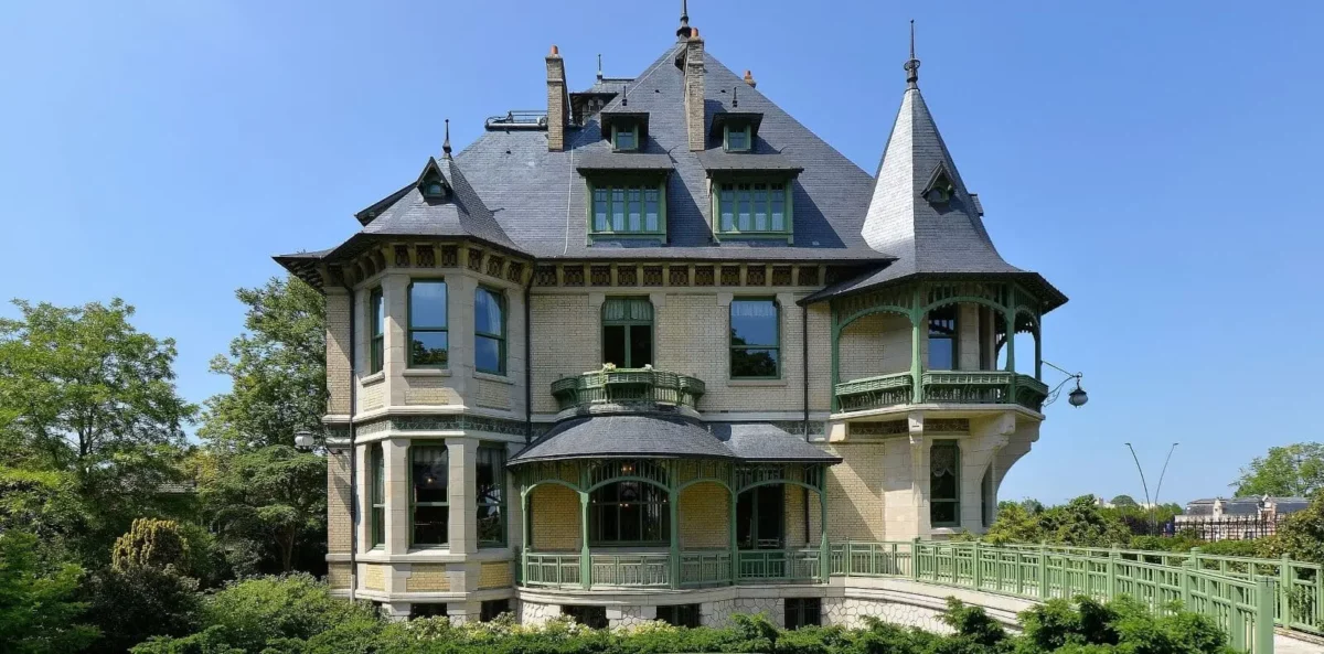 The exquisite Villa Demoiselle in Reims, showcasing Belle Époque elegance and architecture amidst lush greenery.